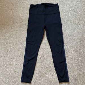 Athleta Ultimate 7/8 Tight in Black with Blue Mesh Side Detailing